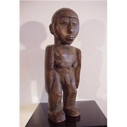 Tribal Art, WINGED FIGURE, a carved wood statue, 17" high, 5" wide, 4" deep, some natural crack...
