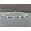 Blue Topaz & Diamond Tennis Bracelet