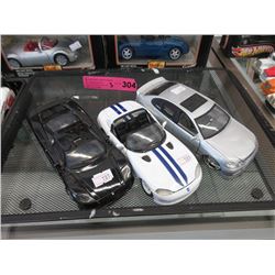 3 Die-Cast Scale Model Cars