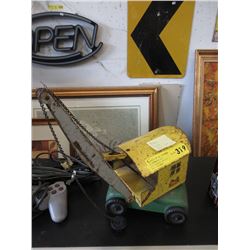 1950 Lincoln Press Steel Crane Toy
