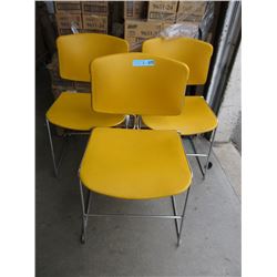 3 Yellow Stacking Chairs