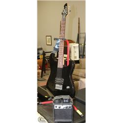 BLACK FIRST ACT ELECTRIC GUITAR WITH STAND