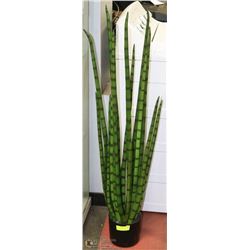 DECORATIVE PLASTIC PLANT WITH BLACK BASE.