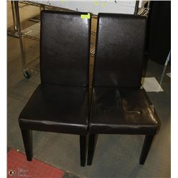 TWO LEATHER LIKE HIGH BACK CHAIRS