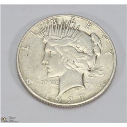 1927 US SILVER DOLLAR.