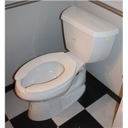 PAIR OF USED KOHLER TOILETS