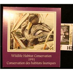 1991 Canadian Wildlife Habitat Conservation $8.50 Stamp in original mint holder.