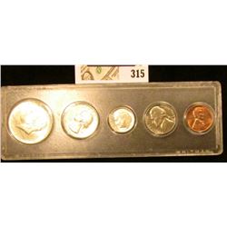 1964 P Gem BU Year set in a Snap tight case. (Five-piece).