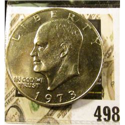 1973 Eisenhower Dollar, BU from Mint Set, value $13 to $65