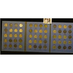 1938-58 Partial Jefferson Nickel set in a blue Whitman folder. Includes (9) Silver War Nickels.
