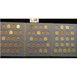 1938-61 Partial Jefferson Nickel set in a blue Whitman folder. Includes (1) Silver War Nickels.