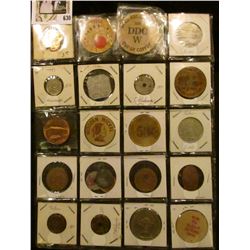 Plastic page containing (22) different Tokens, Wooden Nickels, Medals, Elongates, and etc.