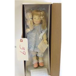 Two Heirloom Tradition Collectible Doll