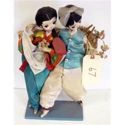 Nylon covered cloth oriental dolls