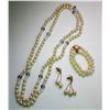 Image 1 : 11 - SUITE OF FAUX PEARLS INCLUDING: