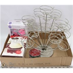 CUPCAKE STAND WITH VARIOUS NE SUPPLIES . HOLDS