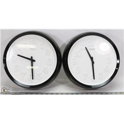FLAT WITH TWO BLACK & WHITE CLOCKS