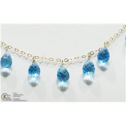 44) 10K YELLOW GOLD BLUE TOPAZ FREE FLOW NECKLACE