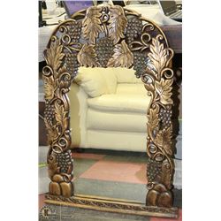 DECORATIVE MIRROR WITH WOOD LIKE FRAME AND GEMS