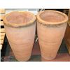 Image 1 : 2 LARGE ORANGE STONE PLANTERS 26" TALL