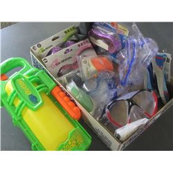 Flat full of Swimming Goggles and 1 Water Blaster