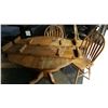 Image 1 : ROUND OAK DINING TABLE WITH 2 LEAFS AND 4 CHAIRS