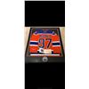 Image 1 : BEAUTIFULLY FRAMED AUTOGRAPHED MCDAVID JERSEY.  CERTIFICATE OF AUTHENTICATION AND MATCHING CARD.