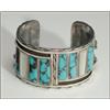 Image 1 : 2 sterling silver open bangles, the first in a Zuni style formed as a thick cuff channel inlaid...