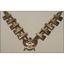 Hopi sterling silver necklace, formed of two strands of ovoid beads centering a Butterfly Dance...