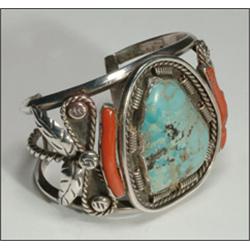 Navajo silver open bangle, formed of a twisted wire band and two carinated bands surmounted wit...