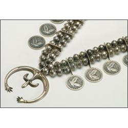 Navajo silver necklace, formed of a double strand of compressed globular beads with 12 spacers...