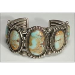 Navajo sterling silver open bangle, formed of 5 wrought bands overlain with 5 graduated panels...