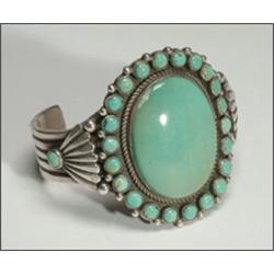 Navajo sterling silver open bangle, formed of a flat ingot band expanding and split to 5 bands...