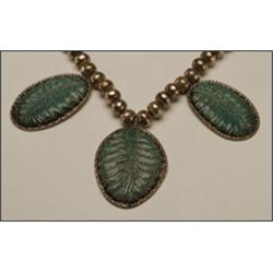 Navajo sterling silver necklace, formed of a single graduated strand of compressed globular sil...