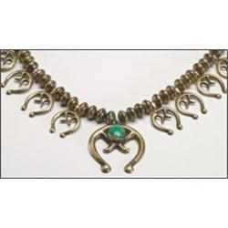 Navajo silver necklace, composed of a double strand of pressed "Liberty" dime beads with 8 sand...