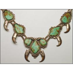 Navajo silver necklace, formed of a double strand of compressed globular beads supporting 5 pan...