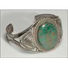 Image 1 : 2 Navajo silver open bangles, each formed as a flared flat band and set with oval turquoise cab...