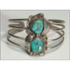 Image 1 : 2 Navajo silver open bangles, the first formed as an ingot band set with 3 oval turquoise caboc...