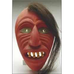 JACOB THOMAS (1922-),, A Cayuga carved and painted wood False Face Society mask, with inset met...