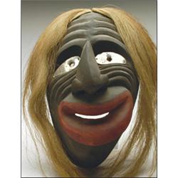 JACOB THOMAS (1922-),, A Cayuga carved and painted wood False Face Society mask, with inset met...