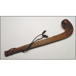 A Great Lakes wood ball head club, with traces of painted foliage decoration,, 20" - 50.8 cm....