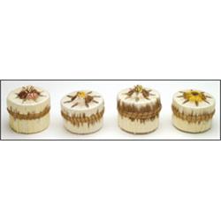 A group of four Woodland circular lidded birch bark boxes, each decorated with colourful quillwor...