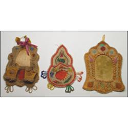 A group of three Mohawk whimsy picture frames, each decorated with floral beadwork, one piece dat...
