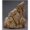 Image 1 : GARFIELD THOMAS, A stone carving of a group of native figures dancing with the moon, the moon w...