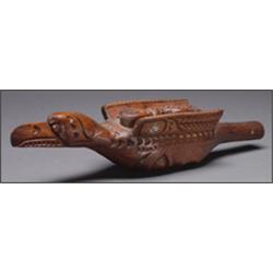 A Northwest Coast wood ceremonial rattle carved as a bird, with inset abalone decoration, 17" - 4...