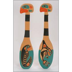 GARY BAKER, A pair of Northwest Coast carved and painted wood ceremonial paddles, decorated wit...