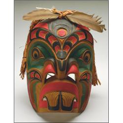ROSS HUNT, A Northwest Coast Kwakiutl carved and painted wood Beaver mask, with cedar bark and...