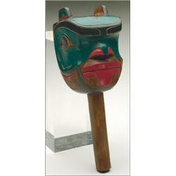 PETER CARROLL, A Northwest Coast carved and painted wood ceremonial animal rattle, with inset a...