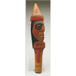 KELVIN JOHNSTON, A Northwest Coast wood ceremonial rattle, carved and painted as a figure weari...