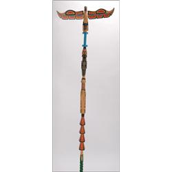 RUTH BAKER, A Northwest Coast wood talking-stick, carved and painted with an eagle, a killer wh...